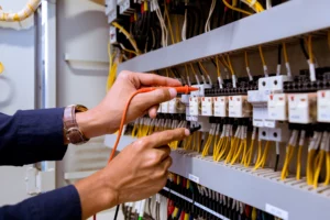 electrician-measurements-with-multimeter-testing-current-electric-control-panel